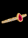 S7.5 | Ruby Red Teardrop CZ Ring in 10K Yellow Gold with Pavé Accents