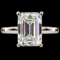 An emerald-cut diamond ring with a silver-colored band, set against a solid black background.